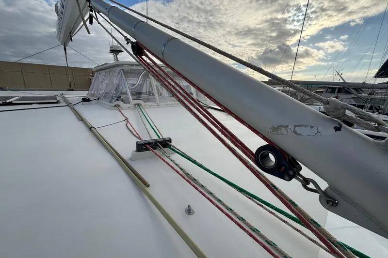  Yacht Photos Pics 2009 Kelsall 58 KSS yacht deck with rigging and mast under cloudy sky.