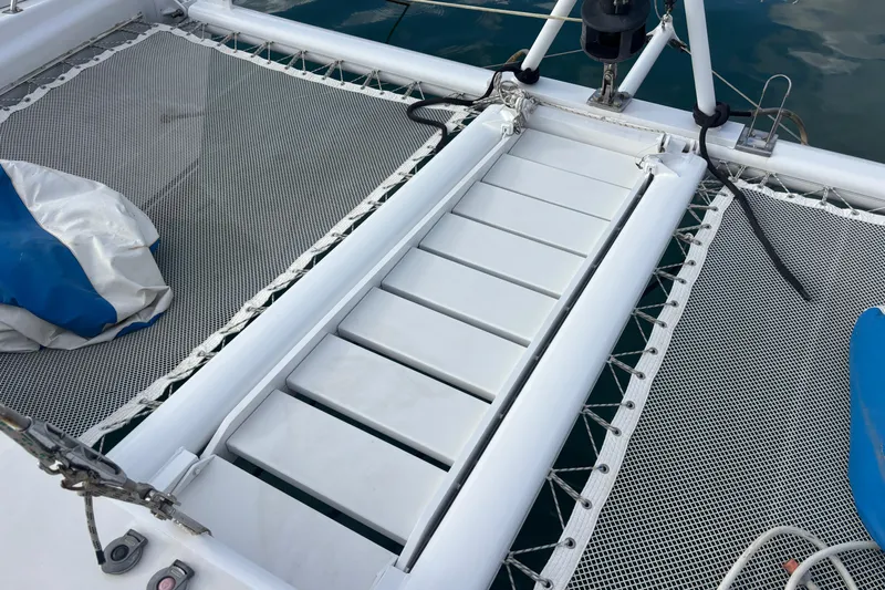  Yacht Photos Pics Deck of 2009 Kelsall 58 KSS catamaran with netting and equipment.