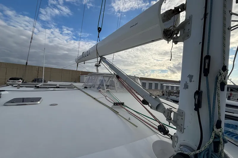  Yacht Photos Pics Sailing yacht Kelsall 58 KSS, 2009 model, docked under a partly cloudy sky.