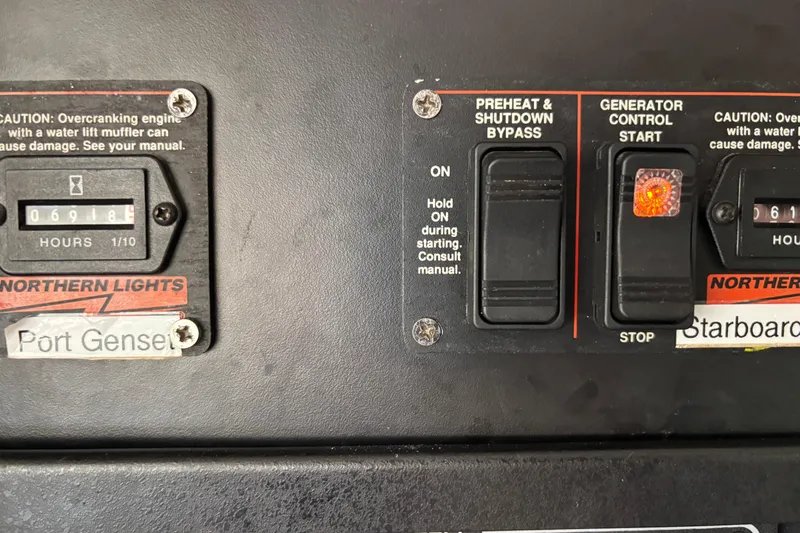  Yacht Photos Pics Control panel of a 2009 Kelsall 58 KSS with generator hour meters and switches.