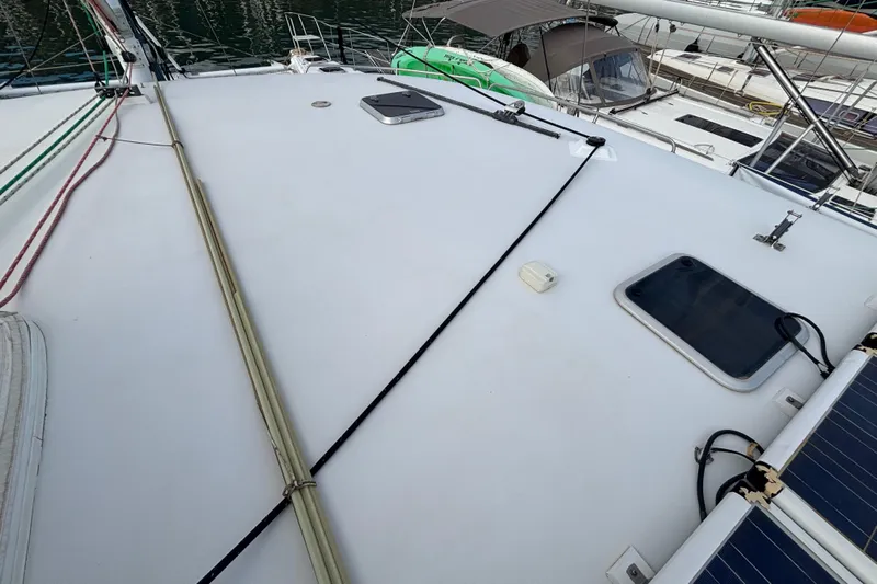  Yacht Photos Pics Deck view of 2009 Kelsall 58 KSS catamaran with solar panels and hatches.
