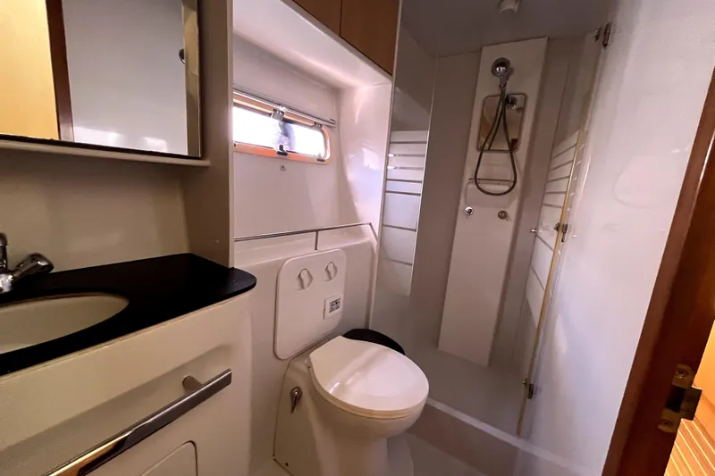  Yacht Photos Pics Bathroom interior of 2009 Kelsall 58 KSS yacht with shower and toilet.