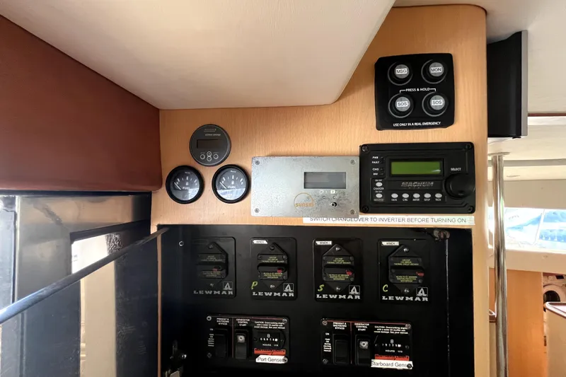  Yacht Photos Pics Control panel of a 2009 Kelsall 58 KSS yacht with gauges and switches.