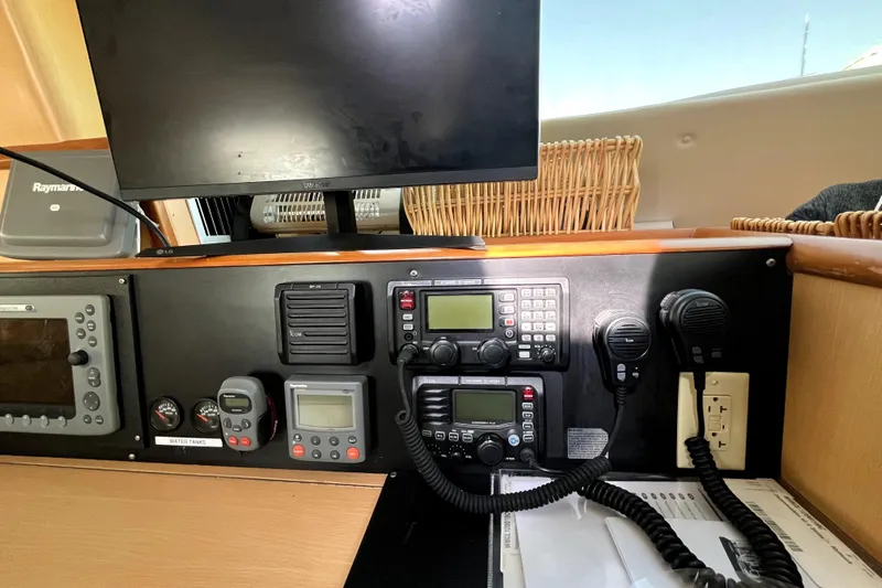  Yacht Photos Pics Control panel of 2009 Kelsall 58 KSS yacht with navigation and communication equipment.