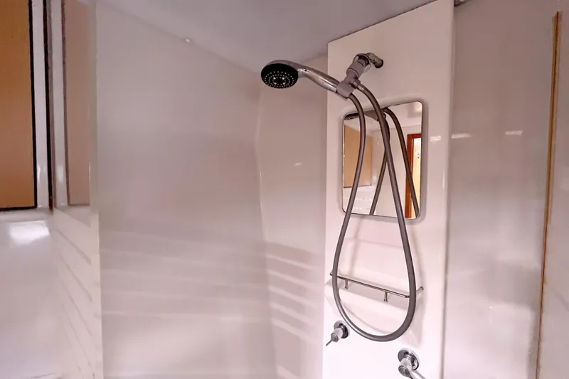  Yacht Photos Pics Shower area in 2009 Kelsall 58 KSS yacht, featuring modern fixtures.