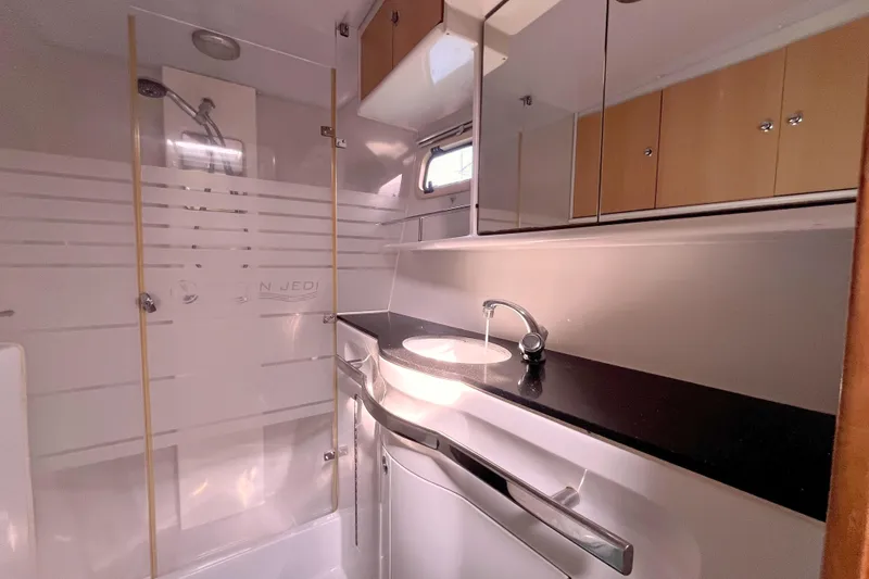  Yacht Photos Pics Luxurious bathroom in 2009 Kelsall 58 KSS yacht with modern fixtures and sleek design.