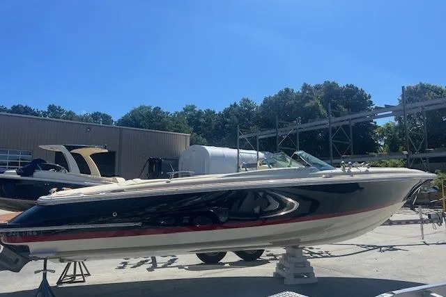  Yacht Photos Pics 2024 Chris-Craft Launch 27 boat displayed outdoors on a sunny day.