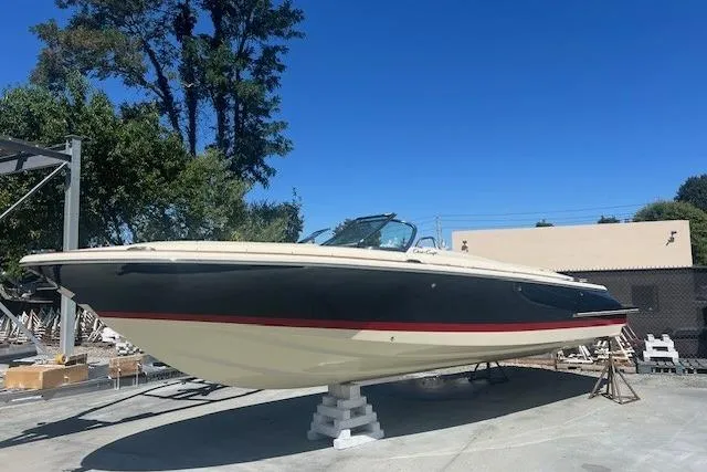  Yacht Photos Pics 2024 Chris-Craft Launch 27 boat on display, featuring sleek design and elegant lines.