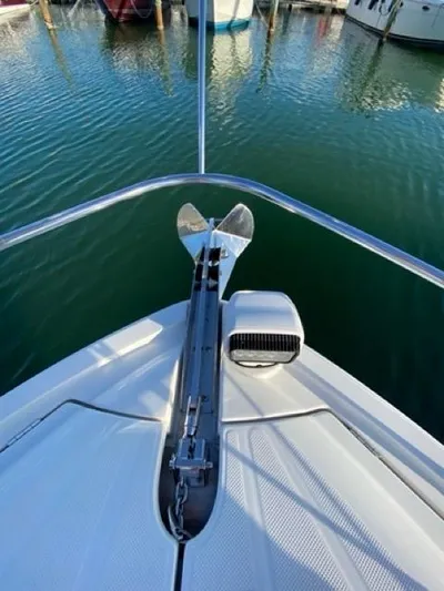  Yacht Photos Pics 2009 Meridian 391 Sedan yacht bow with anchor in marina.