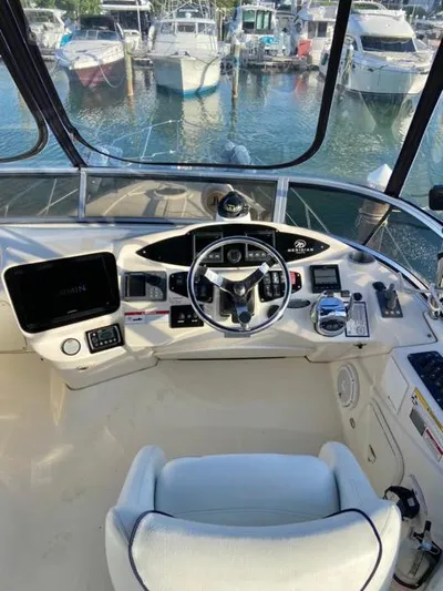 Yacht Photos Pics 2009 Meridian 391 Sedan helm with marina view.