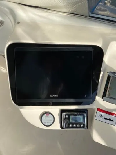  Yacht Photos Pics Garmin display on 2009 Meridian 391 Sedan dashboard with control panel.