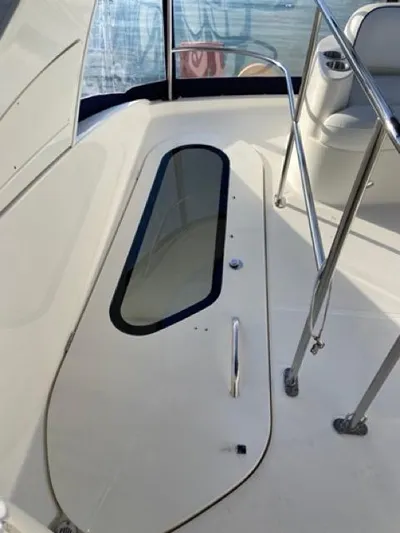  Yacht Photos Pics 2009 Meridian 391 Sedan yacht deck with seating and railing.