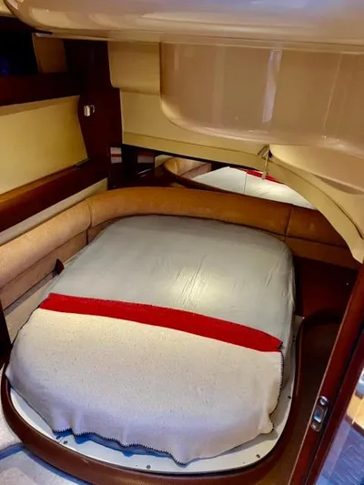  Yacht Photos Pics Cozy cabin interior of 2009 Meridian 391 Sedan yacht with comfortable bed.