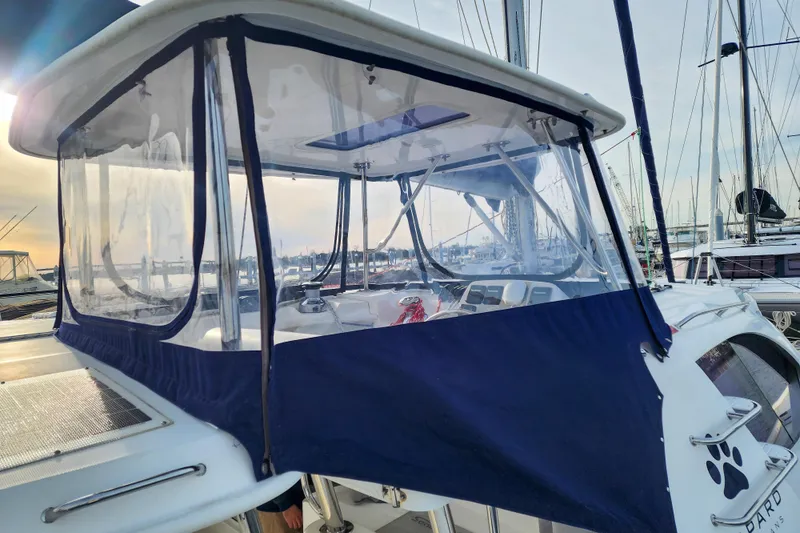 Playtime Yacht Photos Pics 2016 Leopard 44 Owners Version yacht with enclosed cockpit at marina.