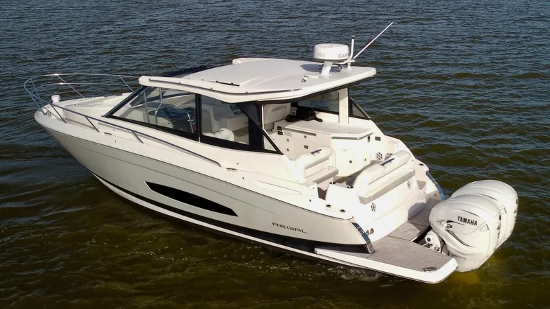 C Life Yacht Photos Pics 2021 Regal 36 XO boat on water, featuring sleek design and Yamaha outboard engines.