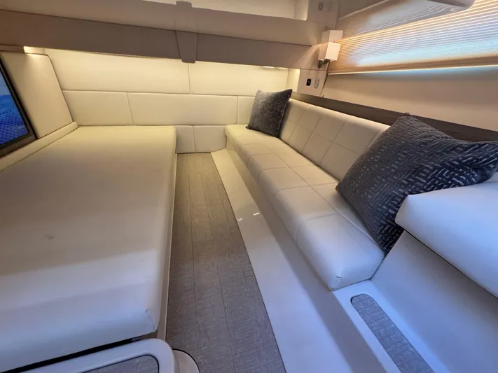 C Life Yacht Photos Pics Luxurious interior of 2021 Regal 36 XO yacht with plush seating and modern design.