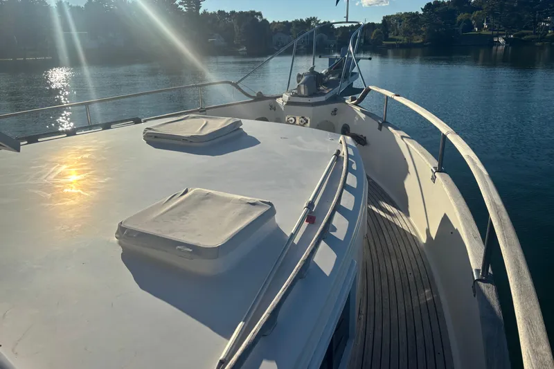 Maximon Yacht Photos Pics 1989 Grand Banks 46 Classic yacht deck with sunlit water view.