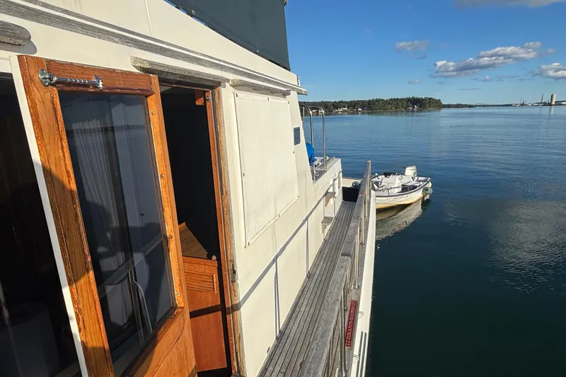 Maximon Yacht Photos Pics 1989 Grand Banks 46 Classic yacht on calm water with clear sky.