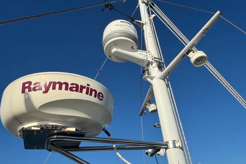 Maximon Yacht Photos Pics Radar equipment on 1989 Grand Banks 46 Classic yacht against clear blue sky.