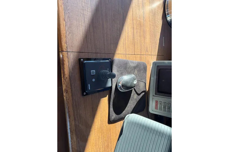 Maximon Yacht Photos Pics Control panel and joystick on 1989 Grand Banks 46 Classic yacht dashboard.