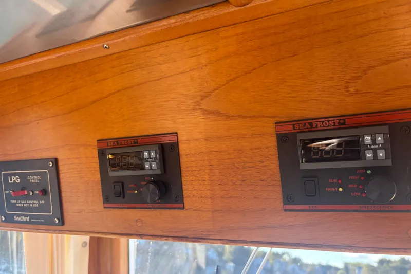 Maximon Yacht Photos Pics Control panels on 1989 Grand Banks 46 Classic yacht, featuring Sea Frost and LPG systems.