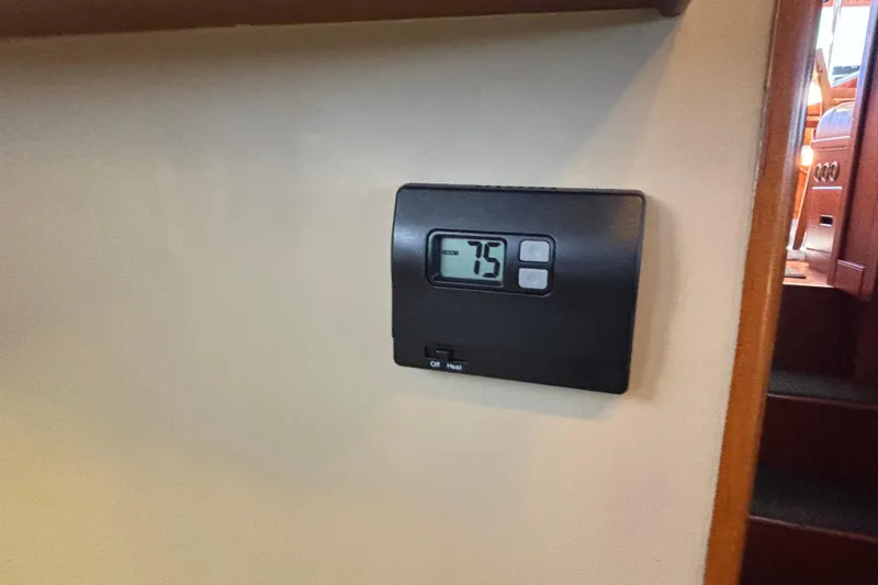 Maximon Yacht Photos Pics Thermostat set to 75&deg;F inside 1989 Grand Banks 46 Classic yacht interior.
