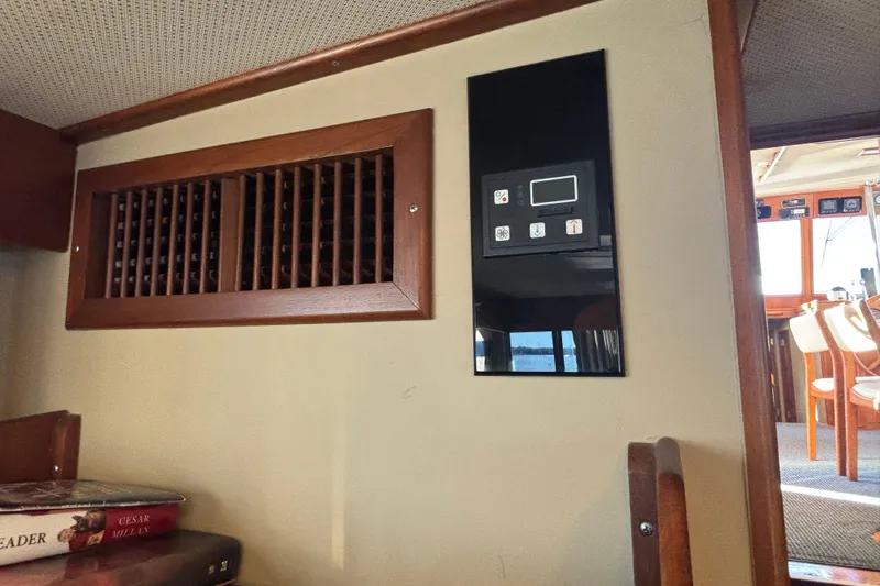 Maximon Yacht Photos Pics Interior of 1989 Grand Banks 46 Classic yacht with wooden vent and control panel.