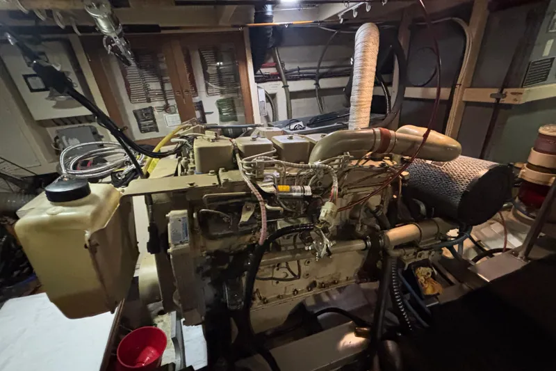 Maximon Yacht Photos Pics Engine room of a 1989 Grand Banks 46 Classic yacht, showcasing detailed machinery.