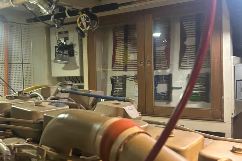 Maximon Yacht Photos Pics Engine room of 1989 Grand Banks 46 Classic yacht with organized wiring and equipment.