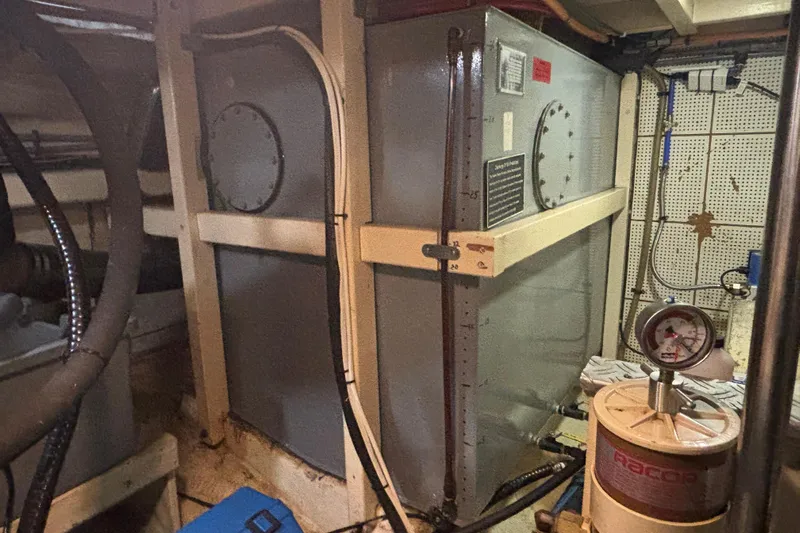 Maximon Yacht Photos Pics Engine room of 1989 Grand Banks 46 Classic yacht, featuring machinery and gauges.