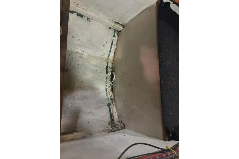 Maximon Yacht Photos Pics Interior view of 1989 Grand Banks 46 Classic boat, showing a storage compartment.