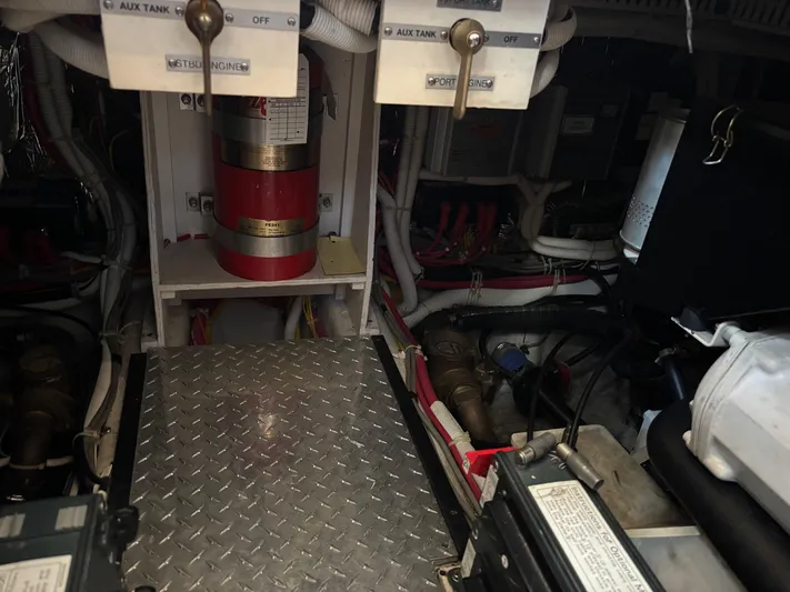  Yacht Photos Pics Engine room of 2003 Carver 444 Cockpit Motor Yacht with fire extinguisher and wiring.