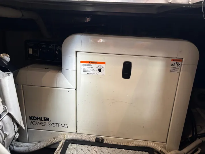  Yacht Photos Pics Kohler power system in 2003 Carver 444 Cockpit Motor Yacht engine room.