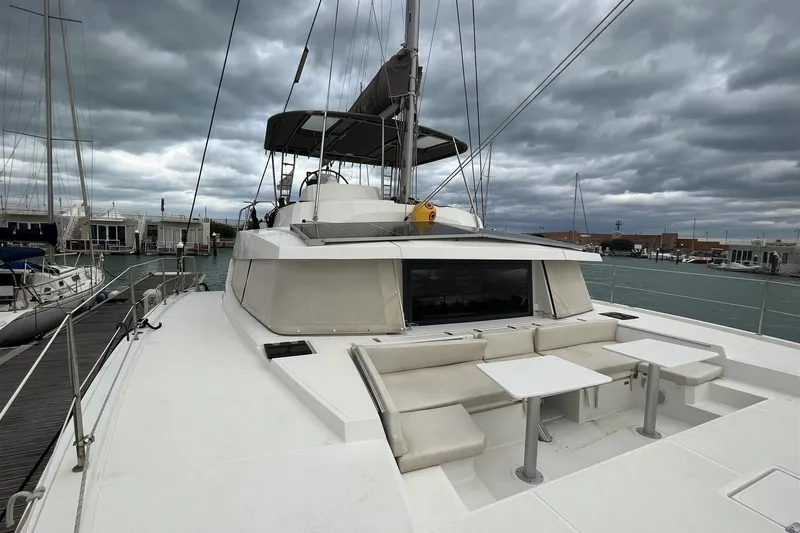  Yacht Photos Pics 2020 Bali 4.3 catamaran docked at marina under cloudy skies.