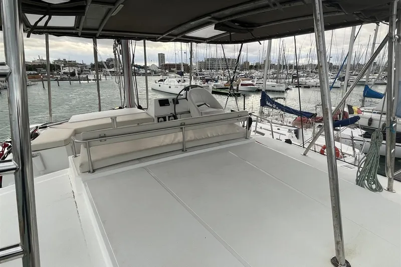  Yacht Photos Pics 2020 Bali 4.3 catamaran deck view in marina, showcasing spacious seating and helm.