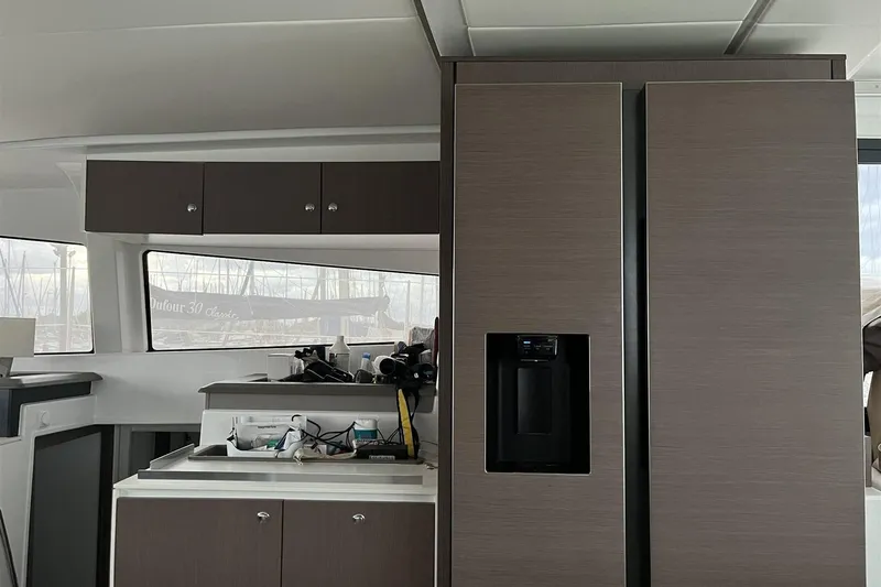  Yacht Photos Pics Modern kitchen interior of 2020 Bali 4.3 yacht with sleek cabinetry and appliances.