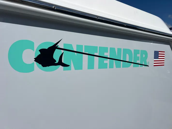  Yacht Photos Pics Contender 32 ST 2025 boat logo with swordfish silhouette and American flag decal.