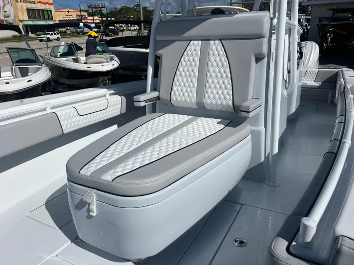  Yacht Photos Pics 2025 Contender 32 ST boat interior with stylish seating and modern design.