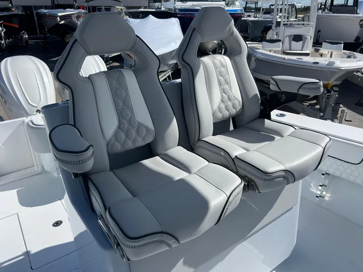  Yacht Photos Pics Luxury seating on 2025 Contender 32 ST boat, featuring sleek, modern design and comfort.
