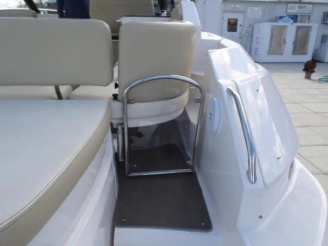 As Good As It Gets Yacht Photos Pics 2012 Regal 42 Sport Coupe boat seating and entry area.