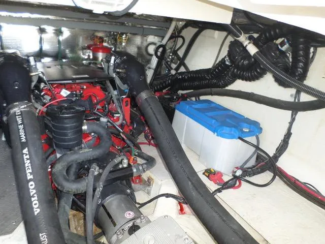 As Good As It Gets Yacht Photos Pics Engine compartment of a 2012 Regal 42 Sport Coupe with Volvo Penta components.
