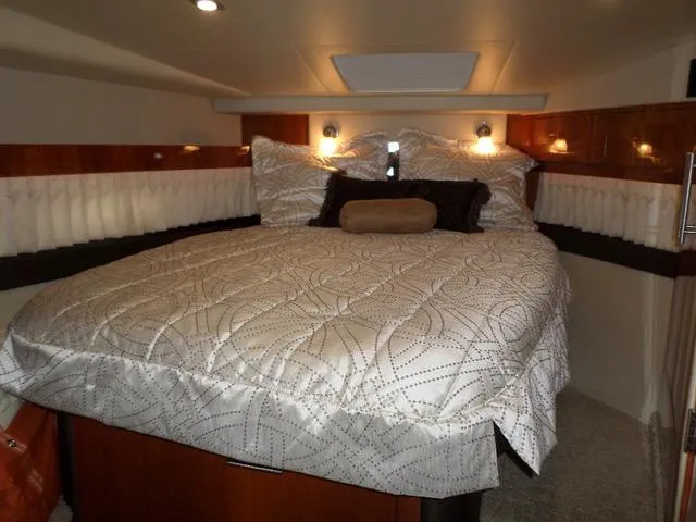 As Good As It Gets Yacht Photos Pics Luxurious bedroom interior of 2012 Regal 42 Sport Coupe yacht.
