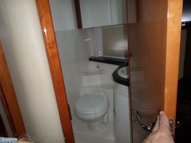 As Good As It Gets Yacht Photos Pics Bathroom interior of a 2012 Regal 42 Sport Coupe yacht.