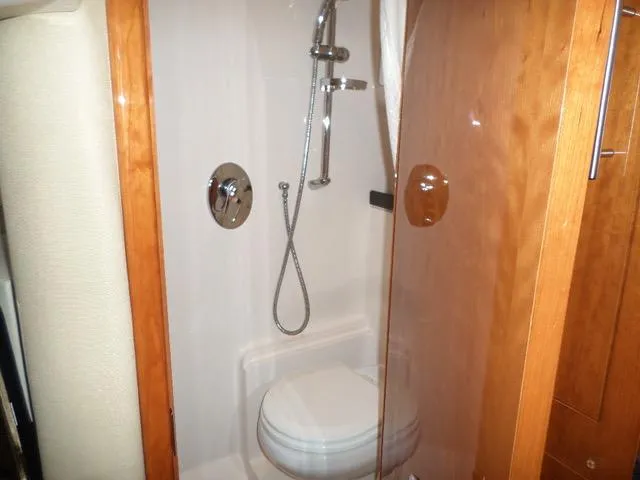 As Good As It Gets Yacht Photos Pics 2012 Regal 42 Sport Coupe bathroom with shower and toilet