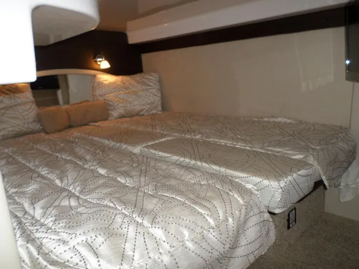 As Good As It Gets Yacht Photos Pics Luxurious bedroom interior of 2012 Regal 42 Sport Coupe yacht with cozy bedding.