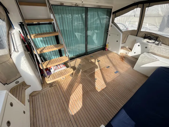  Yacht Photos Pics Luxurious 2010 Fairline Squadron 65 yacht interior with wooden flooring and modern design.