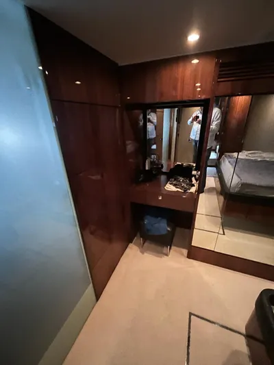  Yacht Photos Pics Luxurious cabin interior of 2010 Fairline Squadron 65 yacht with wooden finishes.