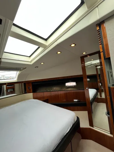  Yacht Photos Pics Luxurious cabin interior of 2010 Fairline Squadron 65 yacht with skylights and modern design.