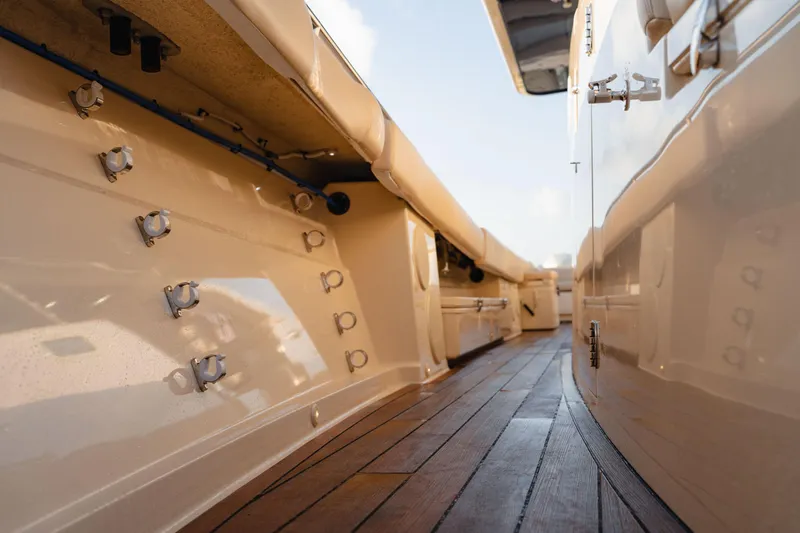  Yacht Photos Pics 2022 HCB 53 Sue&ntilde;os boat deck with sleek design and wooden flooring.