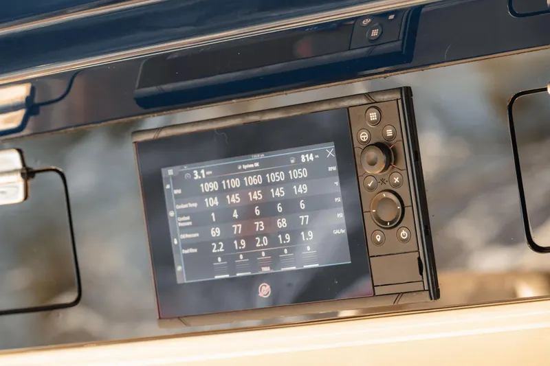  Yacht Photos Pics Control panel of 2022 HCB 53 Sue&ntilde;os boat, featuring digital display and navigation controls.